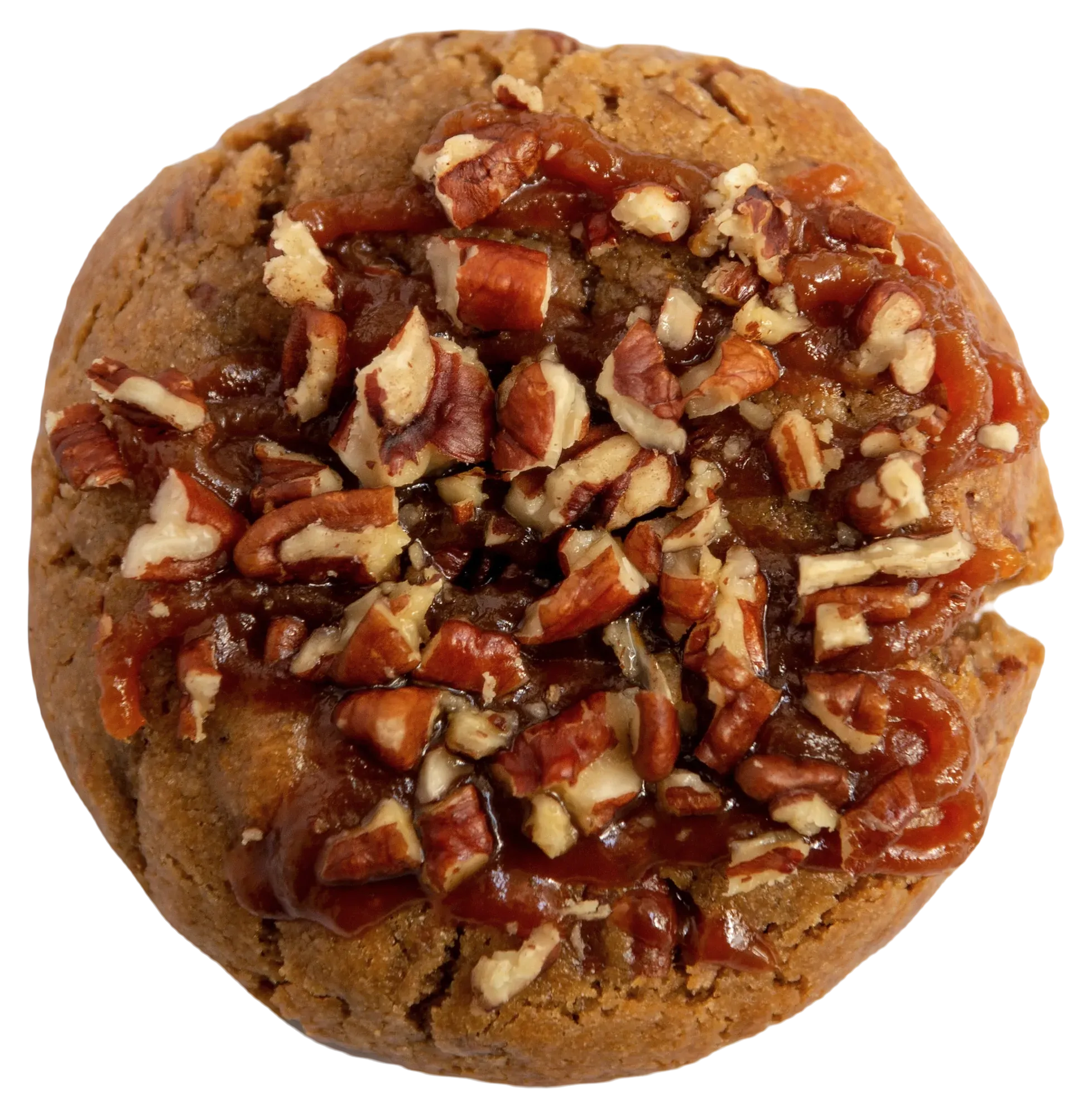 A caramel and pecan cookie, seen from above